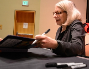 Roz Chast signs a copy of her book 2-21-15