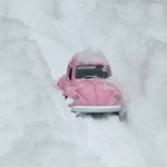 pink car in snow