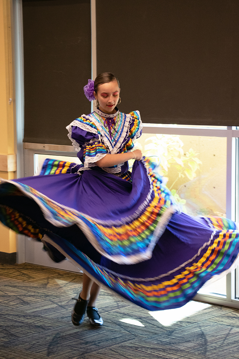 A Culture Fest performer twirling