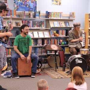 band playing in the children's center of a library