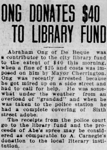 Newspaper clipping with the headline "Ong donates 40 dollars to library fund"