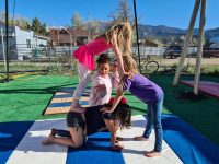 four young girl from a human pyramid